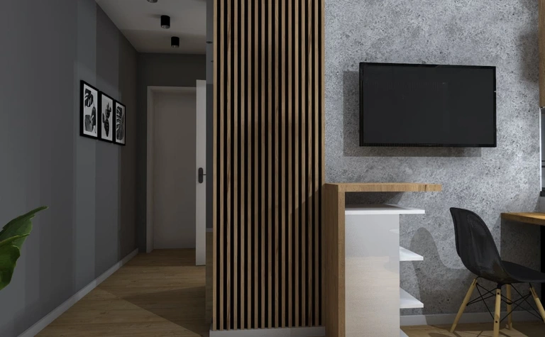 Wnętrze biura w stylu industrialnym z drewnianymi elementami i szarymi ścianami.