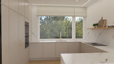Kuchnia w stylu glamour z nowoczesnymi meblami i marmurowymi detalami.