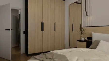 Garderoba minimalistyczna z drewnianymi szafami i lustrem, z jasnymi akcentami.