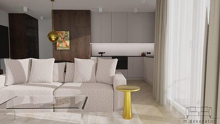 Wnętrze nowoczesnego salonu z beżową sofą, drewnianymi detalami i minimalistycznym stylem.