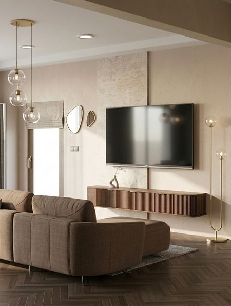 Wnętrze salonu z brązową sofą, telewizorem i minimalistycznym oświetleniem.