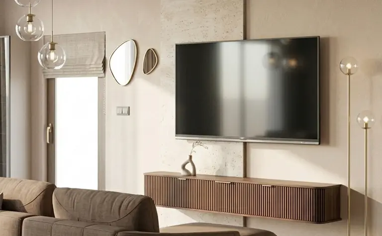 Wnętrze salonu z brązową sofą, telewizorem i minimalistycznym oświetleniem.
