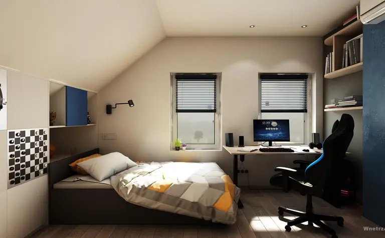 Poddasze z biurkiem, łóżkiem i elementami nowoczesnego designu.