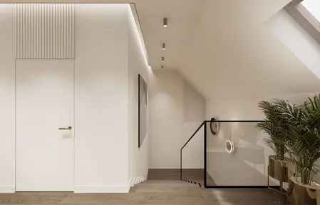 Wnętrze korytarza z minimalistycznym designem, jasne ściany, drewniana podłoga.