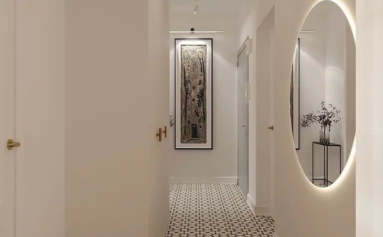 Przedpokój w stylu eklektycznym z nowoczesnym lustrem i quiet luxury detalami.