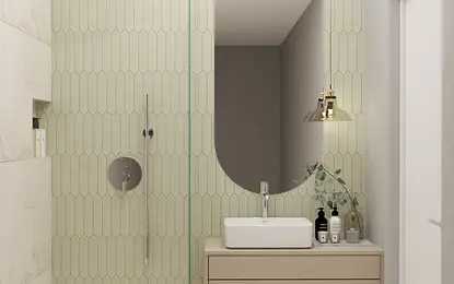 Minimalistyczna łazienka w stylu japandi z zielonymi płytkami.