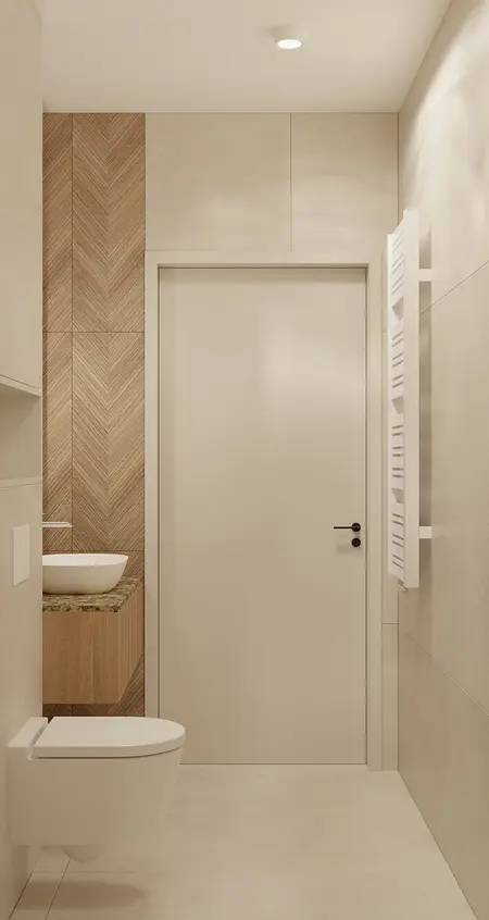 Wnętrze łazienki w stylu japandi z białymi elementami i drewnianymi detalami.