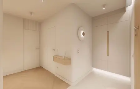 Nowoczesny przedpokój w stylu japandi, minimalistycznym, quiet luxury.