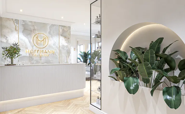 Recepcja z minimalistycznym wystrojem, roślinami i nowoczesnymi akcentami.