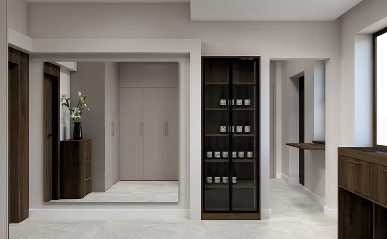 Wnętrze przedpokoju z beżowymi ścianami i drewnianymi meblami, styl współczesny.