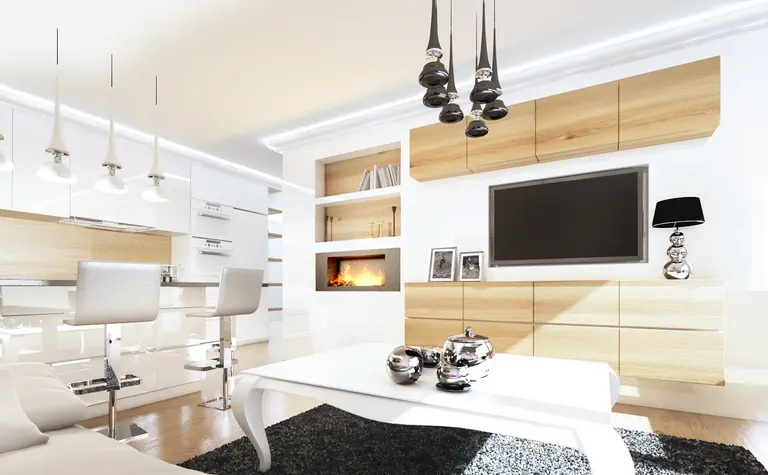 Wnętrze salonu w stylu glamour z białymi meblami, drewnem i minimalistycznymi detalami.