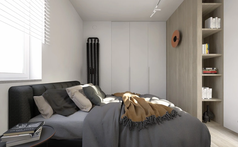 Sypialnia w stylu industrialnym i minimalistycznym z szarym łóżkiem i drewnianymi akcentami.