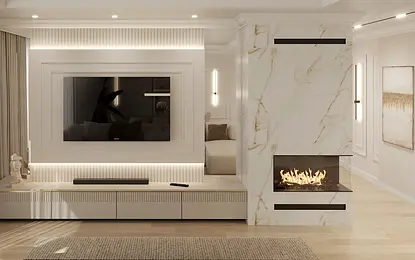 Wnętrze salonu z białymi meblami, kominkiem oraz elementami art deco i glamour.