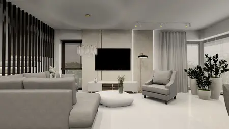 Nowoczesne wnętrze salonu z szarymi meblami, telewizorem i roślinami.