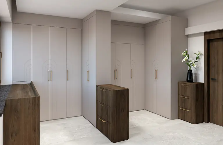 Garderoba z beżowymi meblami i drewnianymi detalami w stylu współczesnym.