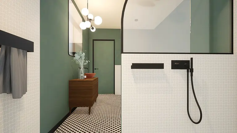 Łazienka w stylu art deco i vintage z zielonymi ścianami i czarnymi detalami.