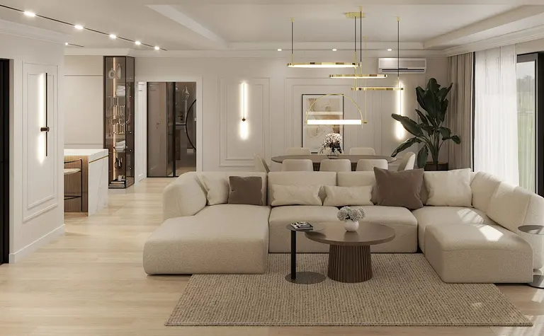 Wnętrze salonu w stylu art deco, glamour i nowoczesnym z jasną sofą i roślinami.