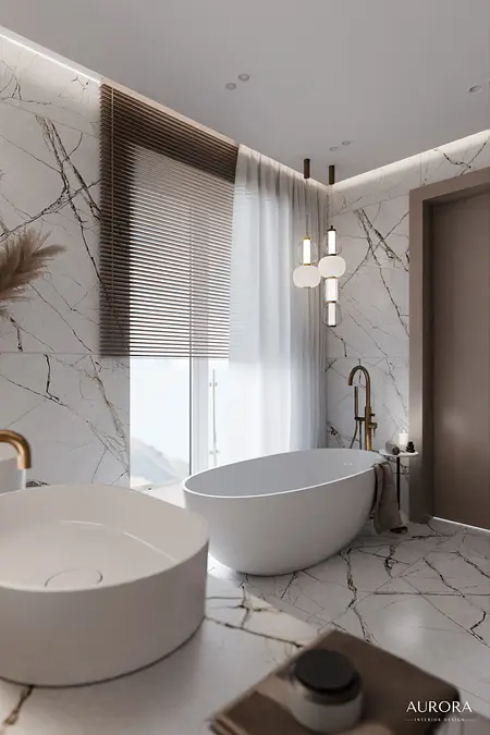 Nowoczesna łazienka z wanną, umywalką i marmurowymi akcentami w stylu dopamine decor i minimaluxe.