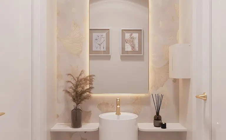Minimalistyczna toaleta z białą umywalką i złotymi detalami.