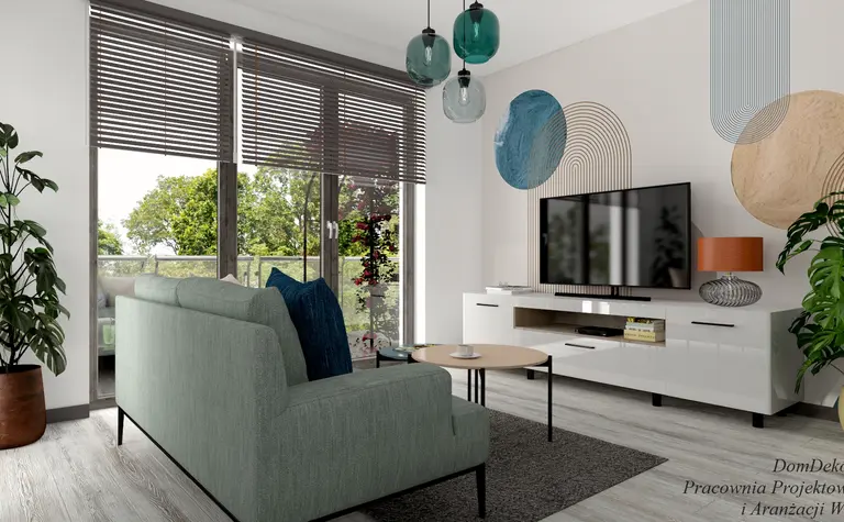 Wnętrze salonu z zielonymi akcentami, minimalistycznym designem i nowoczesnym oświetleniem.