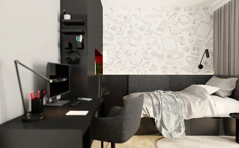 Wnętrze pokoju z biurkiem, szarym łóżkiem i nowoczesnymi akcentami.
