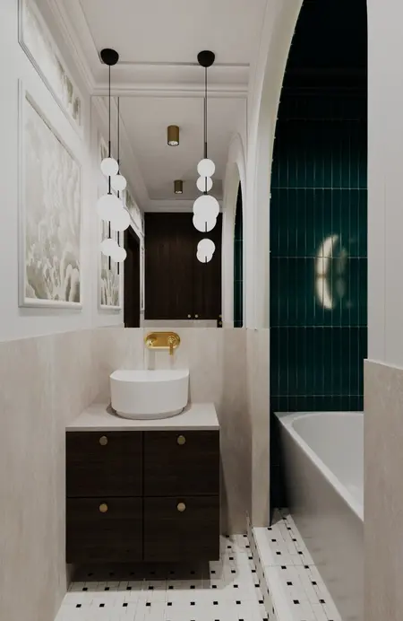 Łazienka w stylu art deco i vintage z białą umywalką, ciemnym blatem i zielonymi kafelkami.