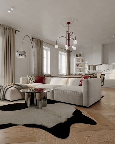 Wnętrze salonu w stylu art deco i minimalistycznym z jasną sofą i nowoczesnym oświetleniem.