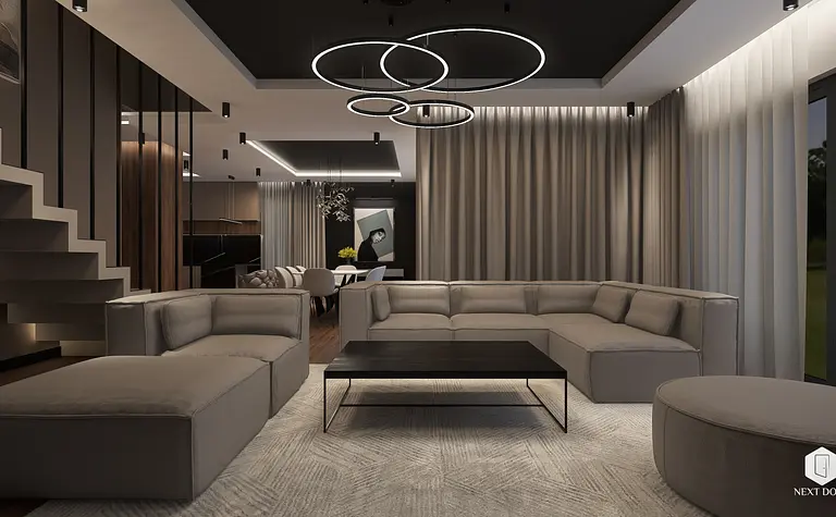 Wnętrze salonu z szaro-beżową sofą, czarnym stolikiem i zasłonami, styl quiet luxury.