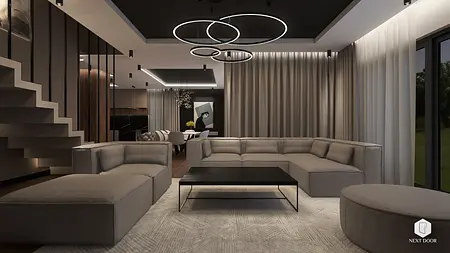 Wnętrze salonu z szaro-beżową sofą, czarnym stolikiem i zasłonami, styl quiet luxury.