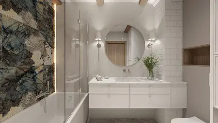 Wnętrze łazienki z białą ceramiką, drewnianymi detalami oraz eleganckim lustrem.
