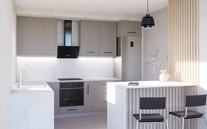 Kuchnia minimalistyczna z szarymi meblami i białym blatem.