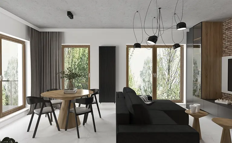 Wnętrze salonu w stylu industrialnym z czarną sofą, drewnianym stołem i dużymi oknami.
