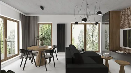 Wnętrze salonu w stylu industrialnym z czarną sofą, drewnianym stołem i dużymi oknami.