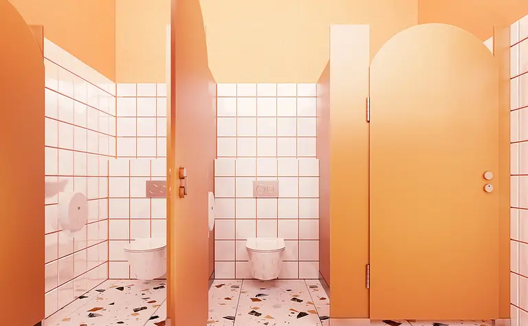 Wnętrze toalety w stylu dopamine decor z pomarańczowymi akcentami i nowoczesnymi płytkami.