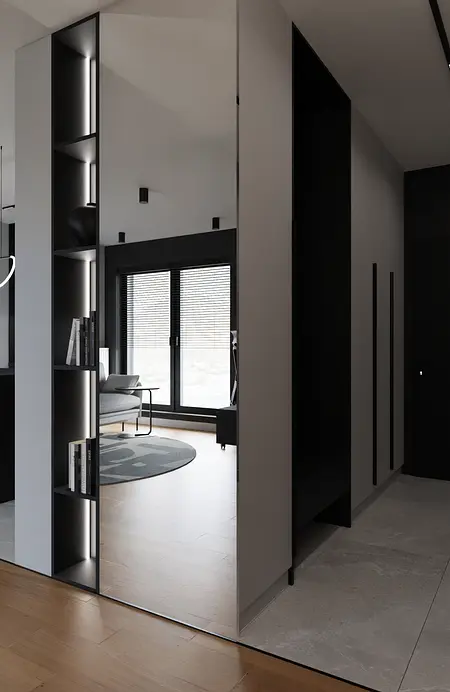 Minimalistyczny przedpokój z czarnymi akcentami, jasnymi ścianami i nowoczesnymi meblami.