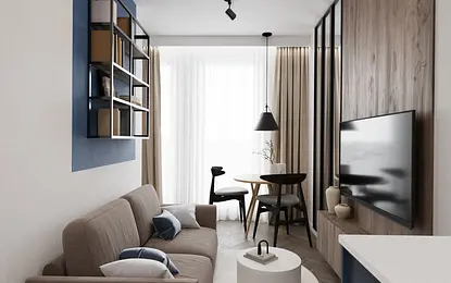 Wnętrze minimalistycznego salonu z brązową sofą i niebieskimi detalami.