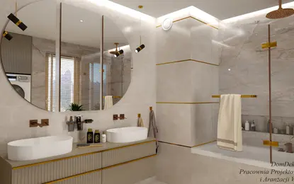 Wnętrze łazienki z białą umywalką, złotymi detalami i minimalistycznym designem.