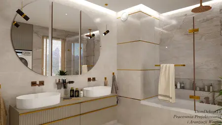 Wnętrze łazienki z białą umywalką, złotymi detalami i minimalistycznym designem.