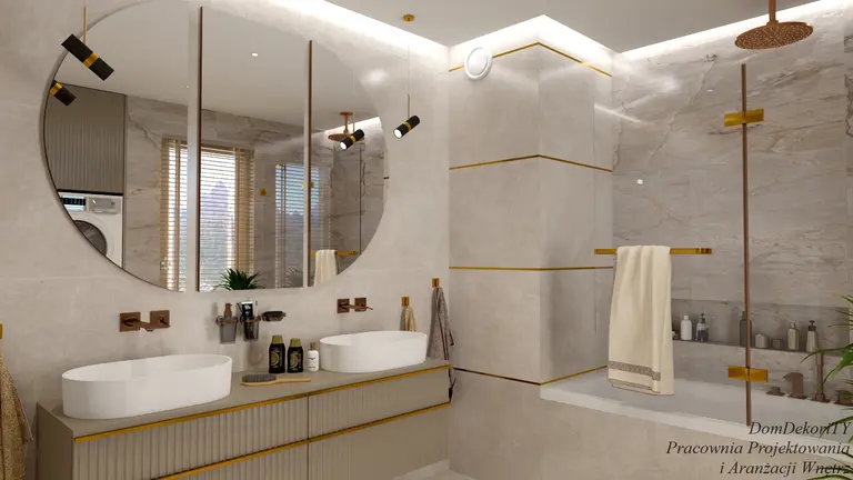 Wnętrze łazienki z białą umywalką, złotymi detalami i minimalistycznym designem.