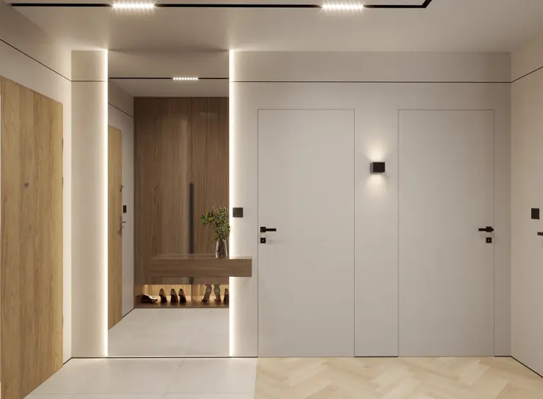 Przedpokój w stylu japandi i minimalistycznym z drewnianymi akcentami.