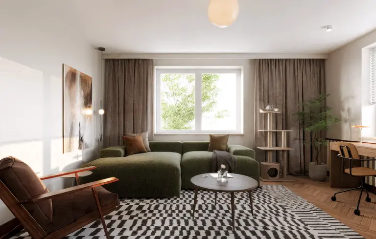 Wnętrze salonu w stylu eklektycznym z zieloną sofą i vintage akcentami.