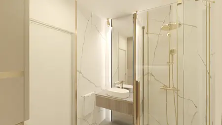 Nowoczesna łazienka z marmurową umywalką i złotymi detalami, styl glamour.