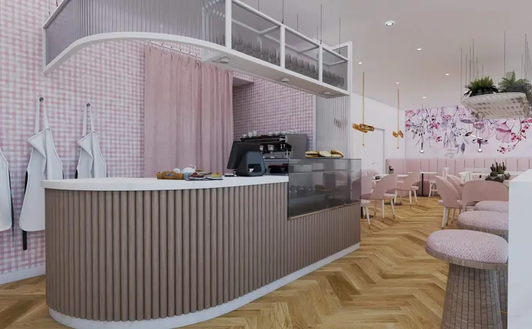 Wnętrze kawiarni z różowymi akcentami i drewnianym blatem, styl dopamine decor.