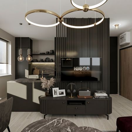 Wnętrze salonu z czarnymi akcentami i nowoczesnym oświetleniem, styl quiet luxury.