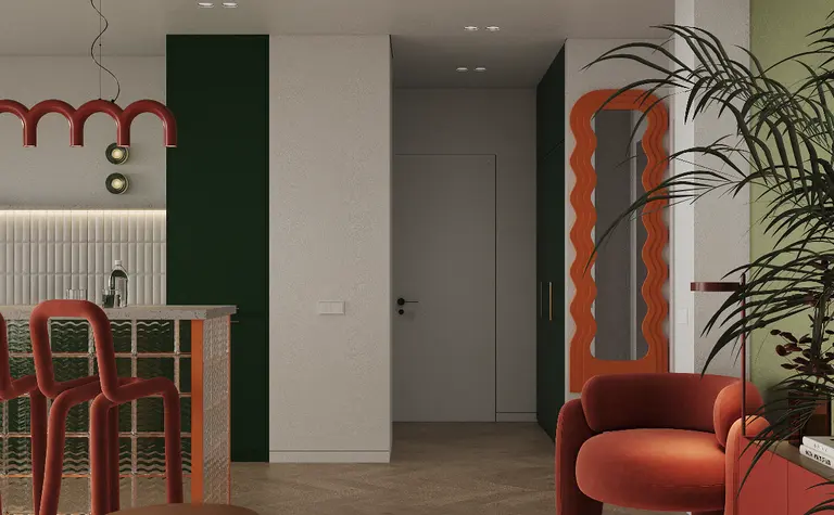 Wnętrze w stylu art deco z pomarańczowymi meblami, zielonymi ścianami i industrialnymi detalami.