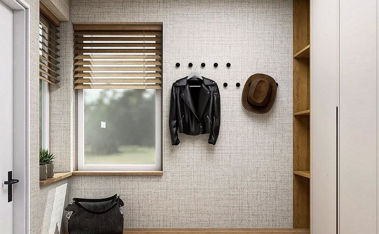 Przedpokój w stylu minimalistycznym z szafą i drewnianymi detalami.