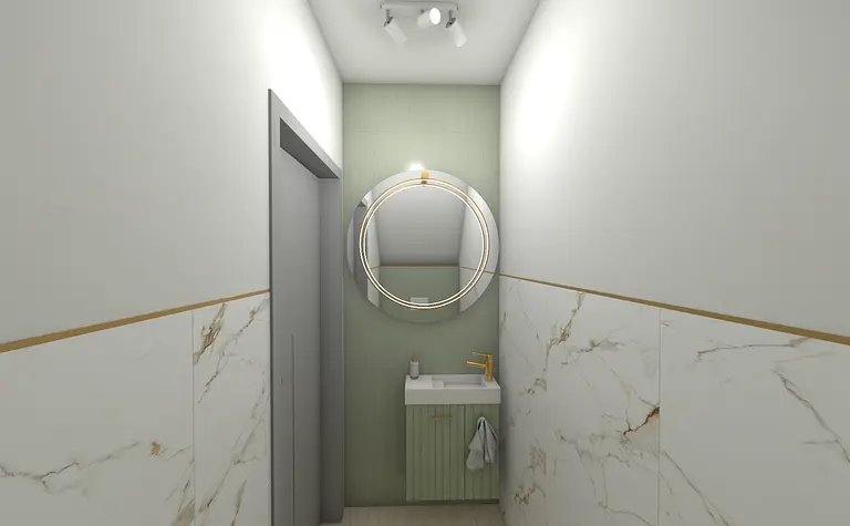 Toaleta z zieloną ścianą, okrągłym lustrem i nowoczesnym umywalką.