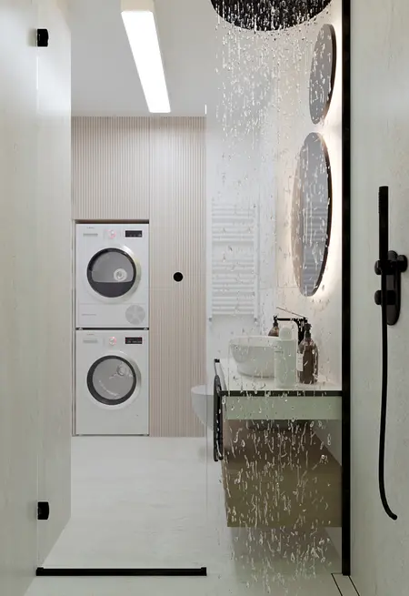 Wnętrze łazienki z elementami minimalistycznymi i nowoczesnymi, prysznic i pralka.