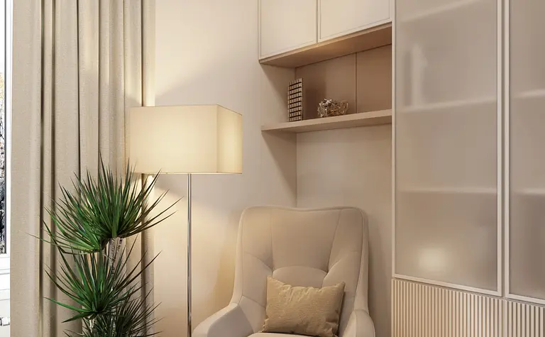 Wnętrze w stylu art deco z jasnym fotelem, rośliną i lampą.