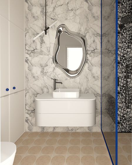 Nowoczesna łazienka z marmurowymi ścianami i elegancką umywalką